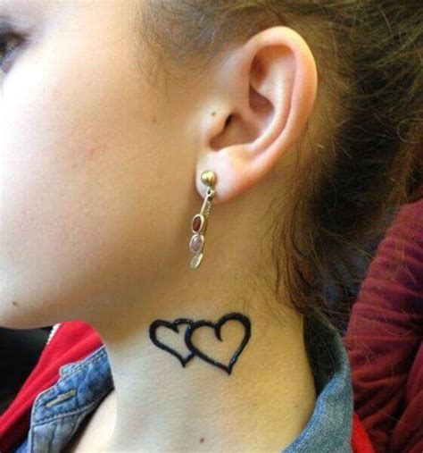 neck heart tattoo|More.